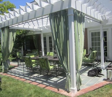 Curtains-draped-around-a-pergola.jpg